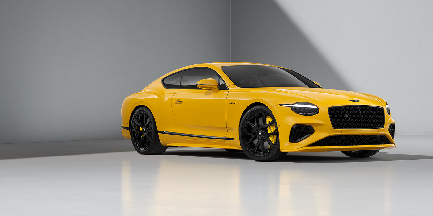 Feser-Graf Exclusive Cars GmbH | Bentley Nürnberg Bentley Continental GT Speed coupe in Monaco Yellow paint and 22" Ten spoke sport wheels - front 3/4