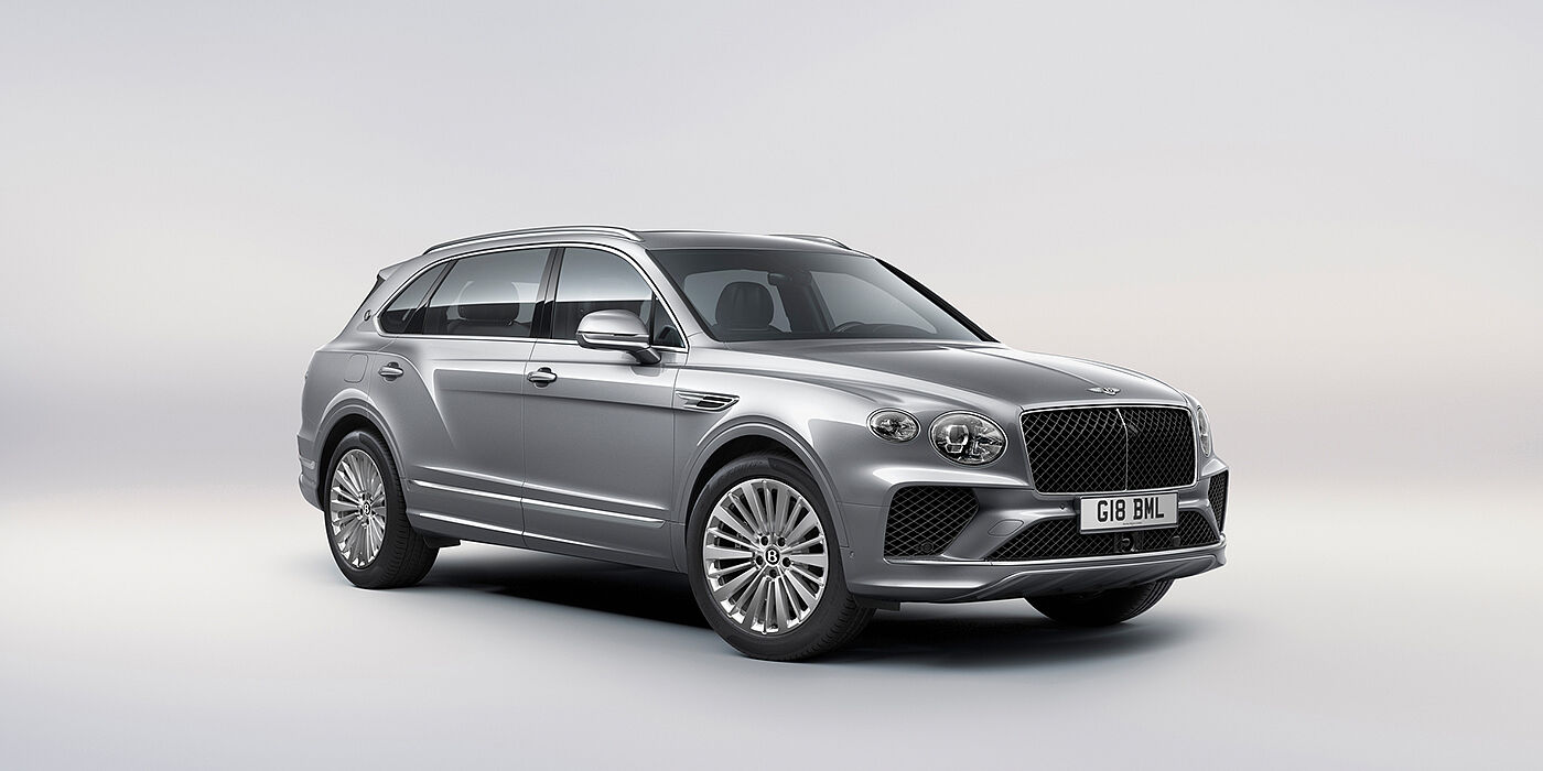 Feser-Graf Exclusive Cars GmbH | Bentley Nürnberg Bentley Bentayga Extended Wheelbase luxury SUV front three quarter view in Moonbeam paint with 21 inch five spoke painted wheels