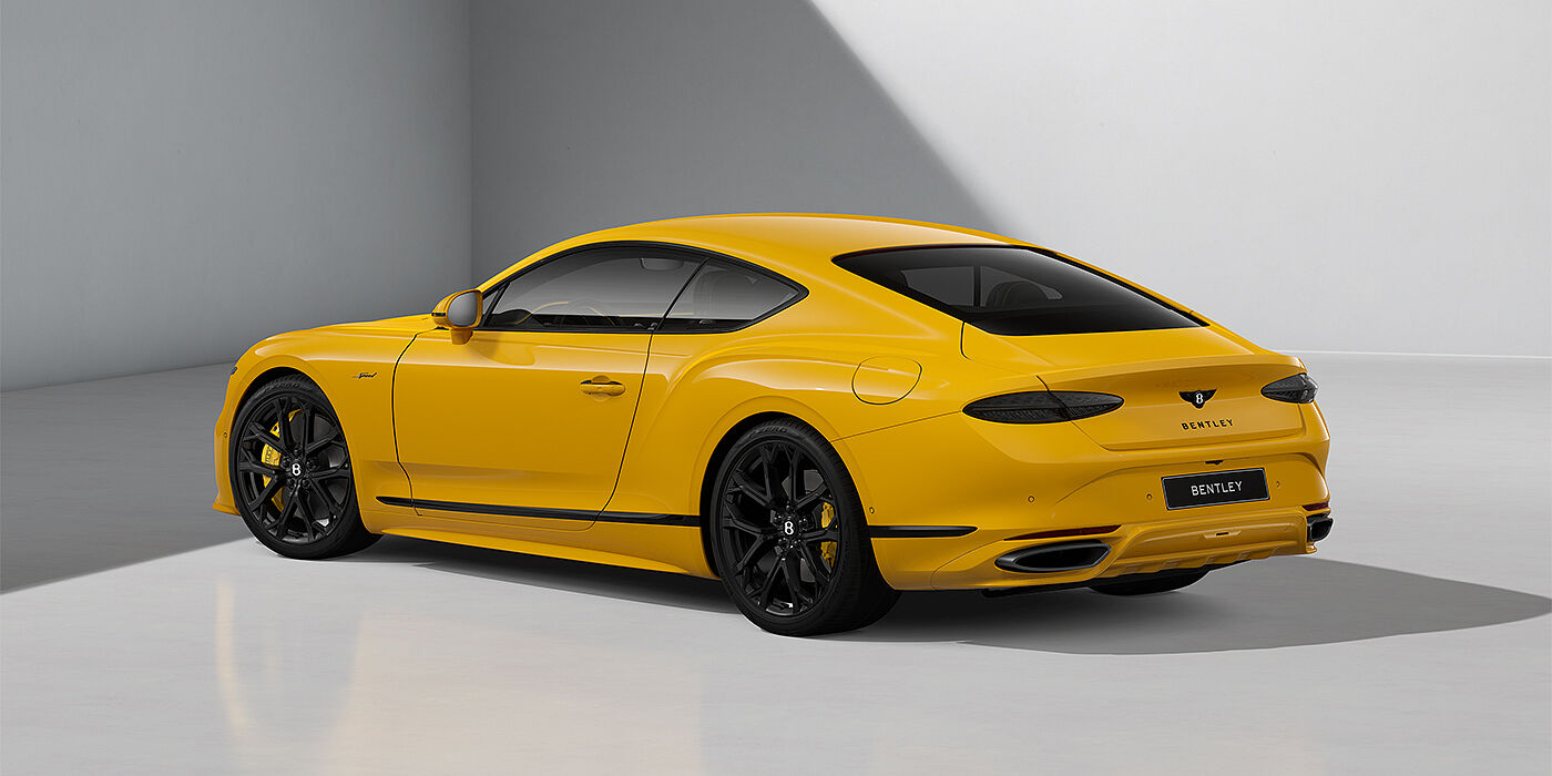 Feser-Graf Exclusive Cars GmbH | Bentley Nürnberg Bentley Continental GT Speed coupe in Monaco Yellow paint and 22" Ten spoke sport wheels - rear 3/4