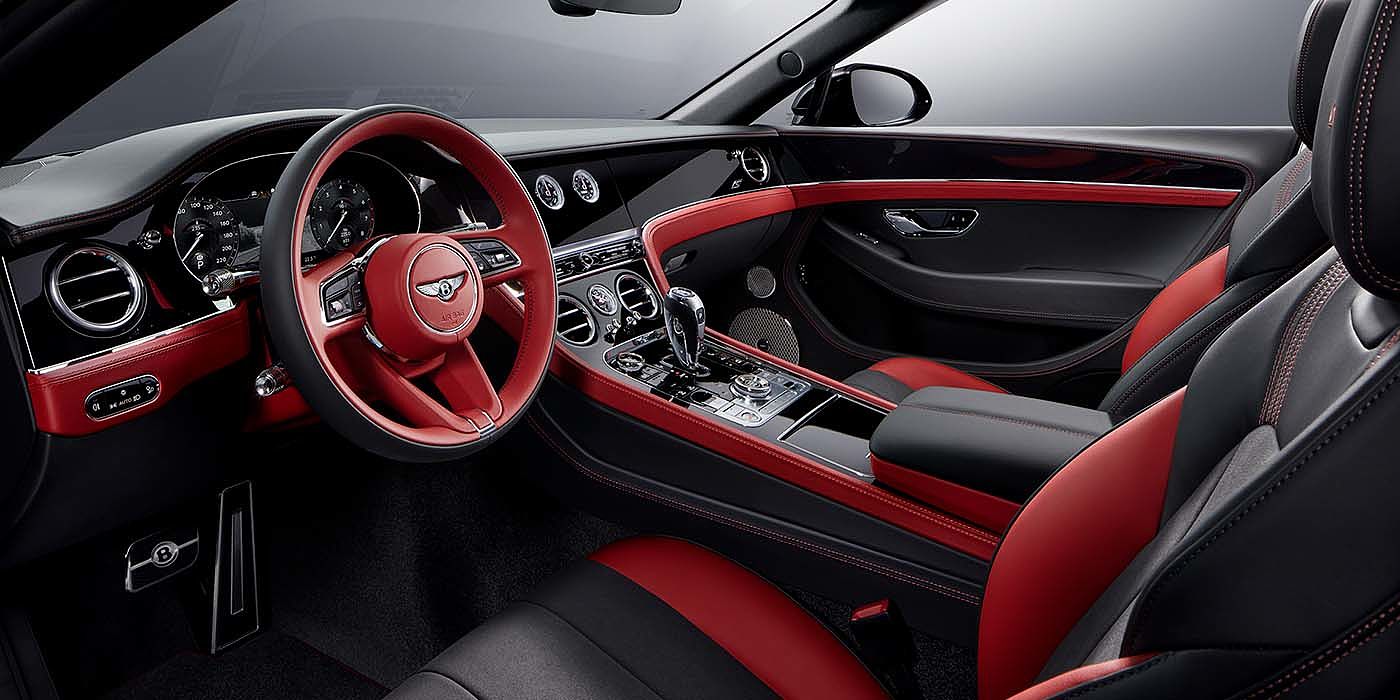 Emil Frey Exclusive Cars GmbH | Bentley Nürnberg Bentley Continental GTC S convertible front interior in Beluga black and Hotspur red hide with high gloss carbon fibre veneer