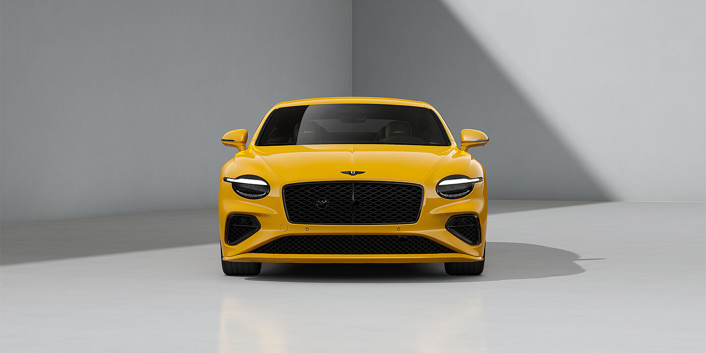 Feser-Graf Exclusive Cars GmbH | Bentley Nürnberg Bentley Continental GT Speed coupe in Monaco Yellow paint and 22" Ten spoke sport wheels - full front