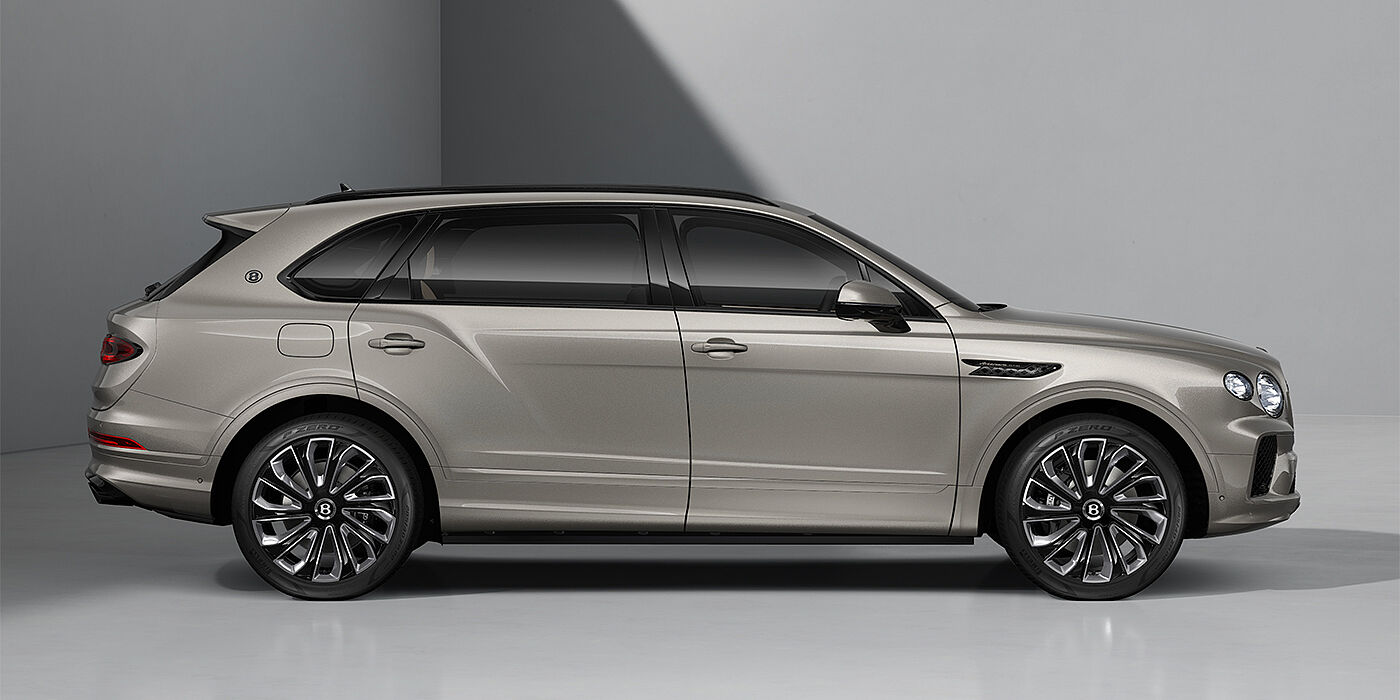 Feser-Graf Exclusive Cars GmbH | Bentley Nürnberg Bentayga EWB Artenara Edition SUV in Pale Brodgar paint with 22" Mulliner Gloss black wheel profile