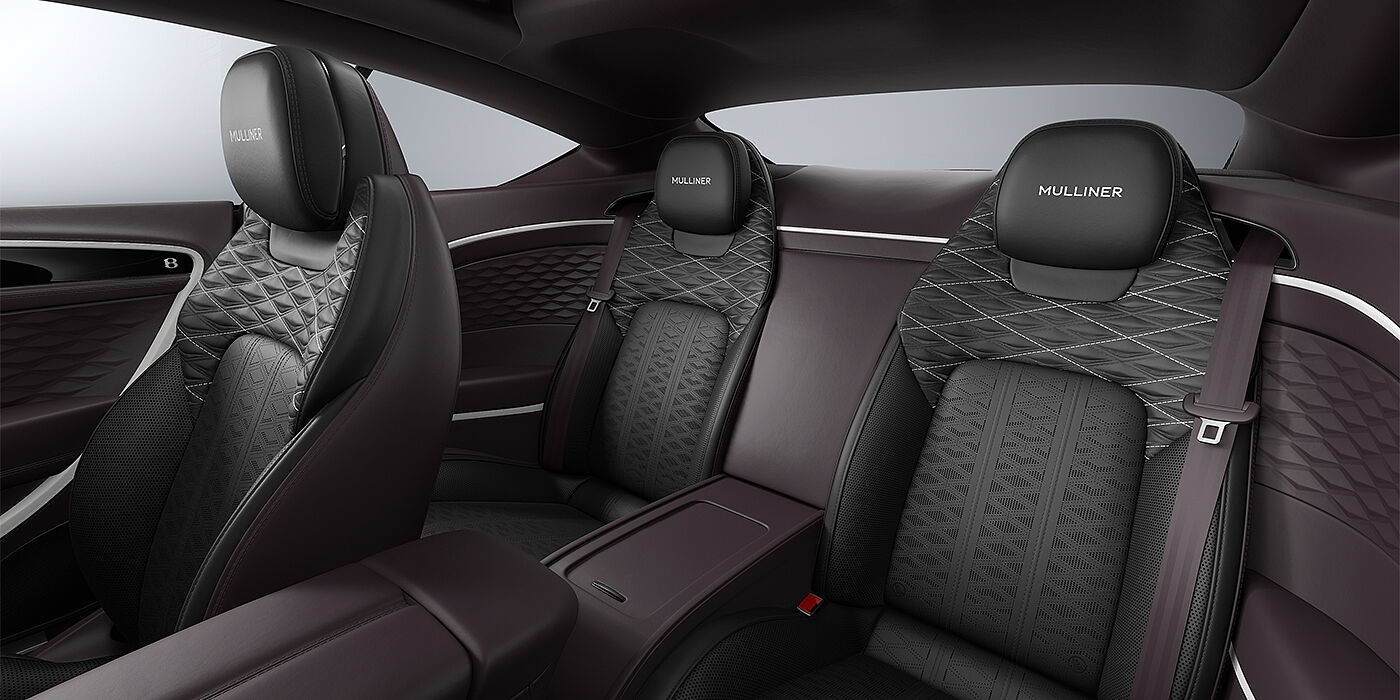 Feser-Graf Exclusive Cars GmbH | Bentley Nürnberg Bentley Continental GT Mulliner coupe rear interior in Beluga black and Damson hides with white accent hide