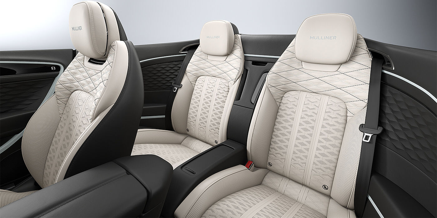 Feser-Graf Exclusive Cars GmbH | Bentley Nürnberg Bentley Continental GTC Mulliner convertible rear interior in Linen and Beluga black hides with Breeze accent hide