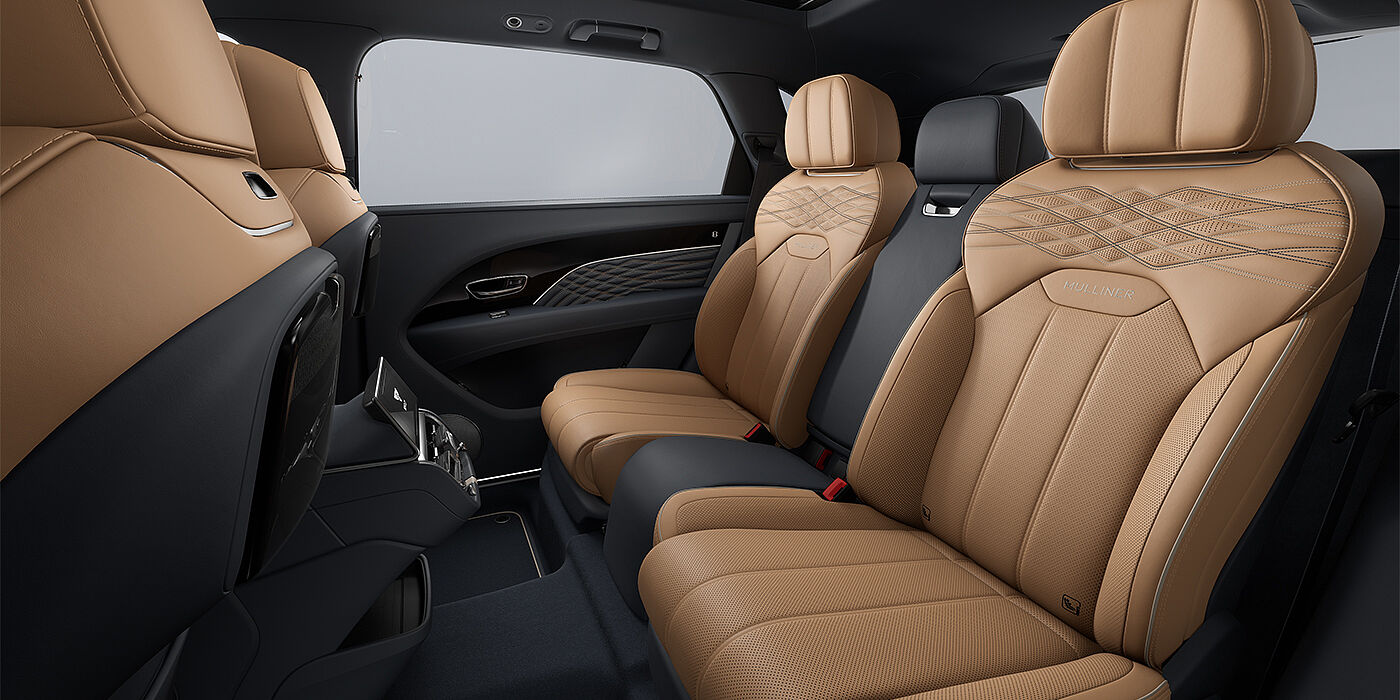 Feser-Graf Exclusive Cars GmbH | Bentley Nürnberg Bentley Bentayga EWB Mulliner SUV rear interior in Camel and Brunel hides with Mulliner contrast stitching