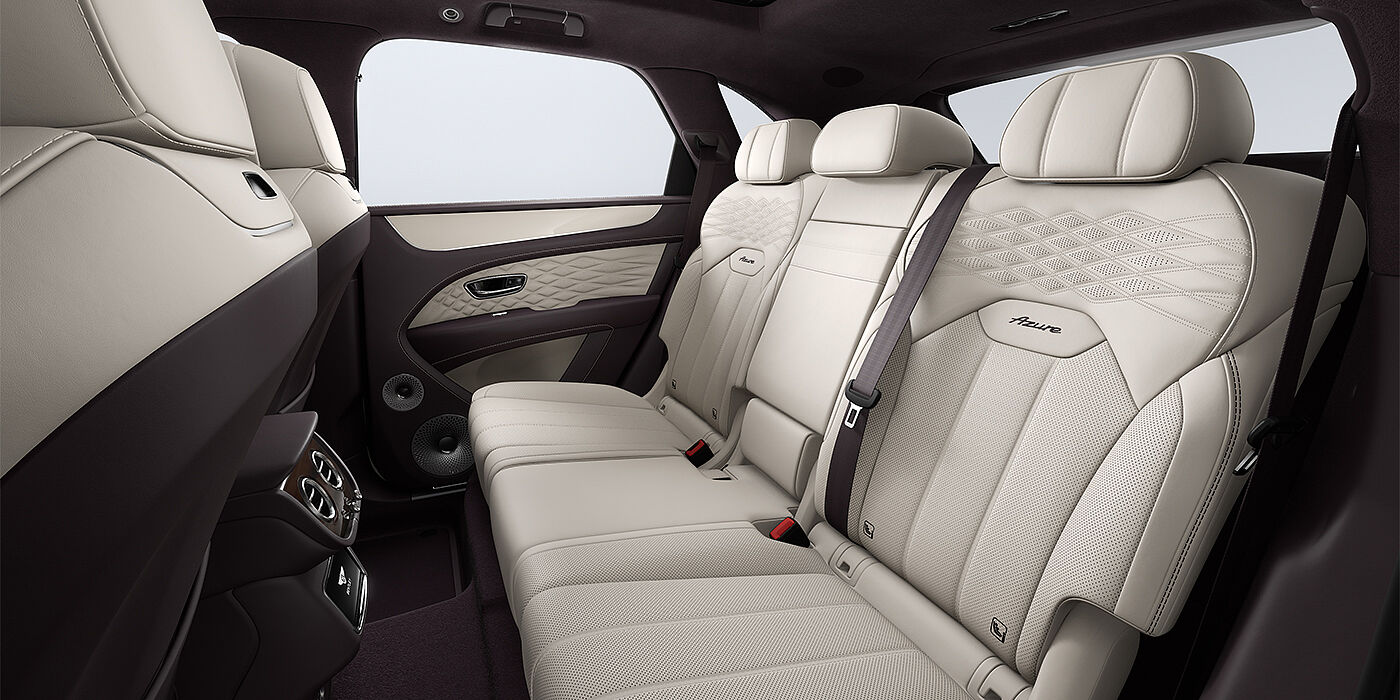 Feser-Graf Exclusive Cars GmbH | Bentley Nürnberg Bentley Bentayga Azure SUV rear interior in Linen and Damson hides and Azure seat stitching