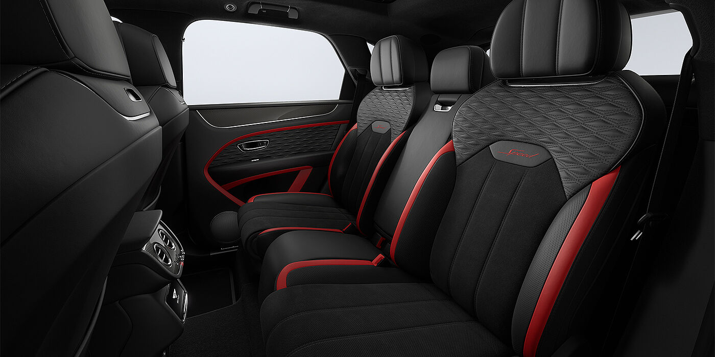 Feser-Graf Exclusive Cars GmbH | Bentley Nürnberg Bentley Bentayga Speed SUV rear interior in Pillar Box Red and Beluga black hides and Speed seat stitching