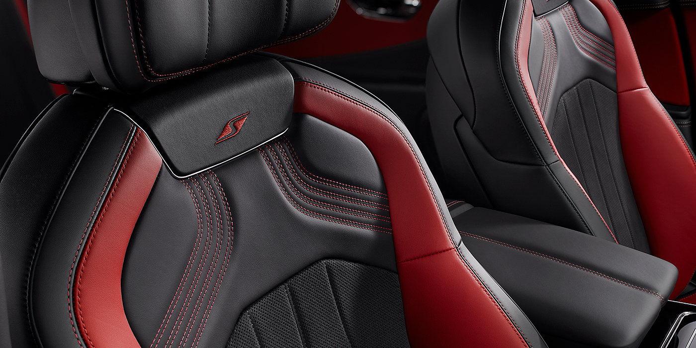 Emil Frey Exclusive Cars GmbH | Bentley Nürnberg Bentley Flying Spur S seat in Beluga black and \hotspur red hide with S emblem stitching