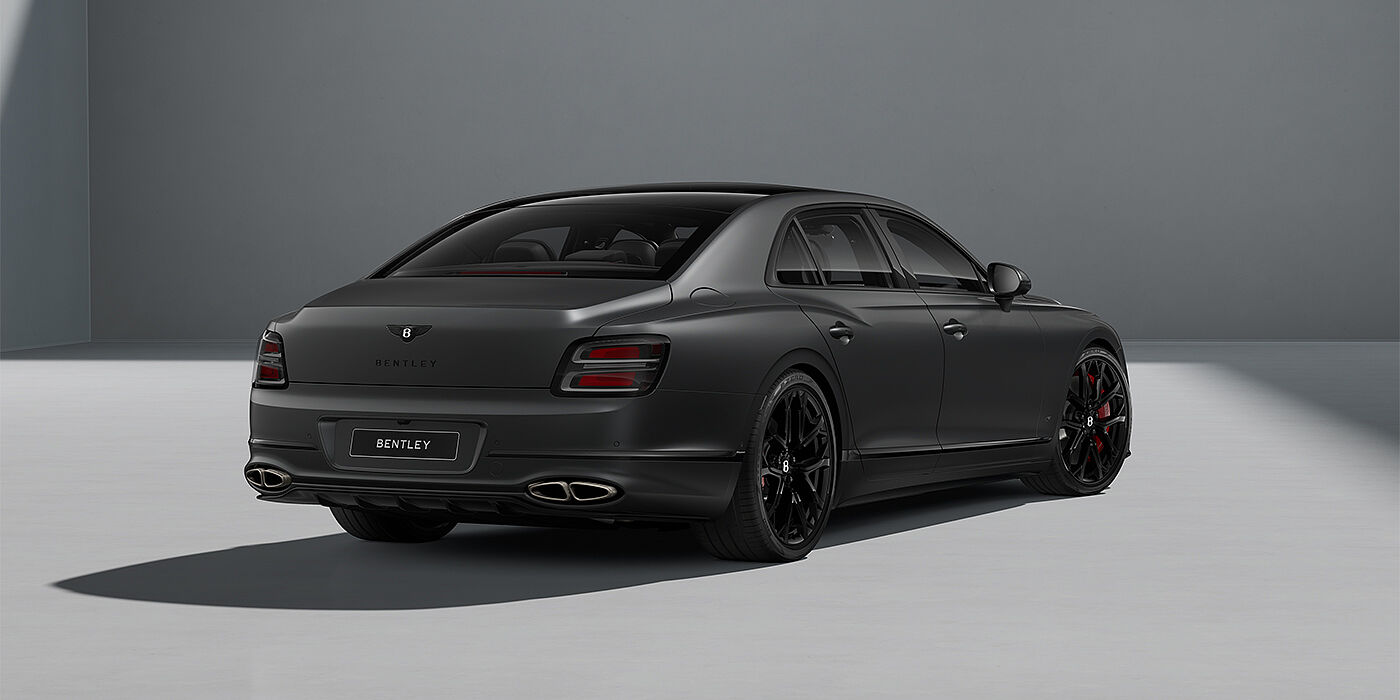 Feser-Graf Exclusive Cars GmbH | Bentley Nürnberg New Bentley Flying Spur S sedan in Anthracite Satin paint rear 3/4 with 22" Sports wheels