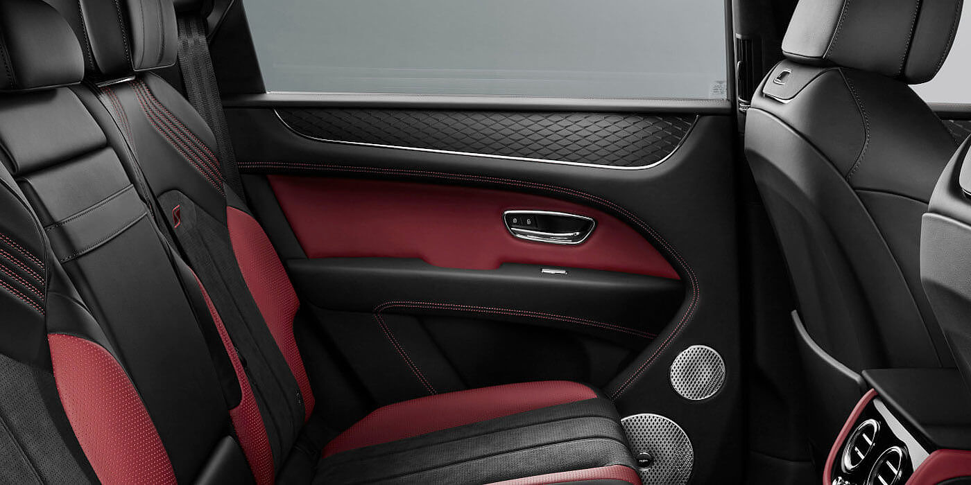 Emil Frey Exclusive Cars GmbH | Bentley Nürnberg Bentley Bentayga S SUV rear interior in Beluga black and Hotspur red hide