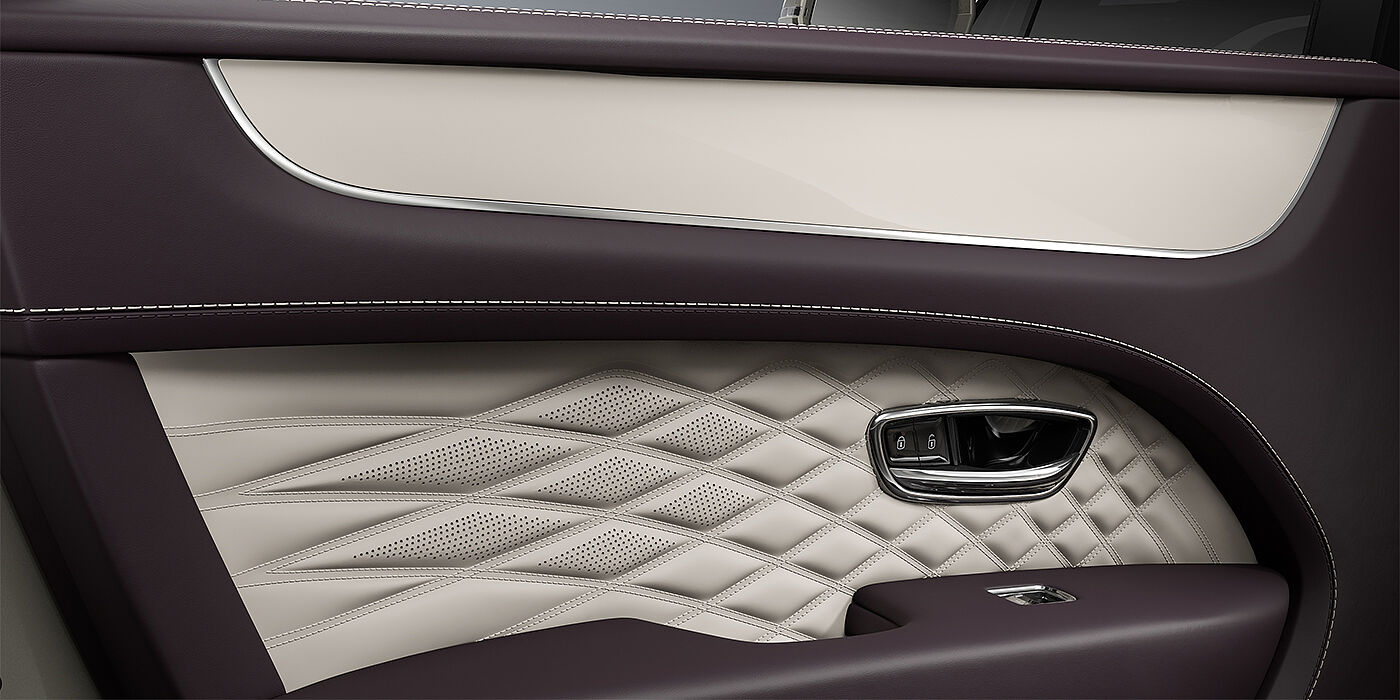 Feser-Graf Exclusive Cars GmbH | Bentley Nürnberg Bentley Bentayga EWB Azure SUV door interior detail in Linen and Damson hides with Piano Linen veneer
