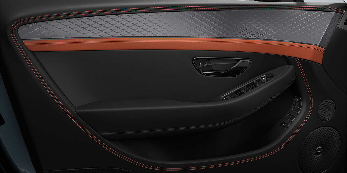 Feser-Graf Exclusive Cars GmbH | Bentley Nürnberg Bentley Continental GT coupe door interior detail in Newmarket Tan and Beluga black hides with Diamond Brushed Dark Tint Aluminium venee