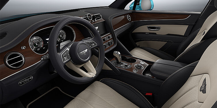 Feser-Graf Exclusive Cars GmbH | Bentley Nürnberg Bentley Bentayga EWB SUV front interior in Portland and Imperial Blue hides with Crown Cut Walnut veneer