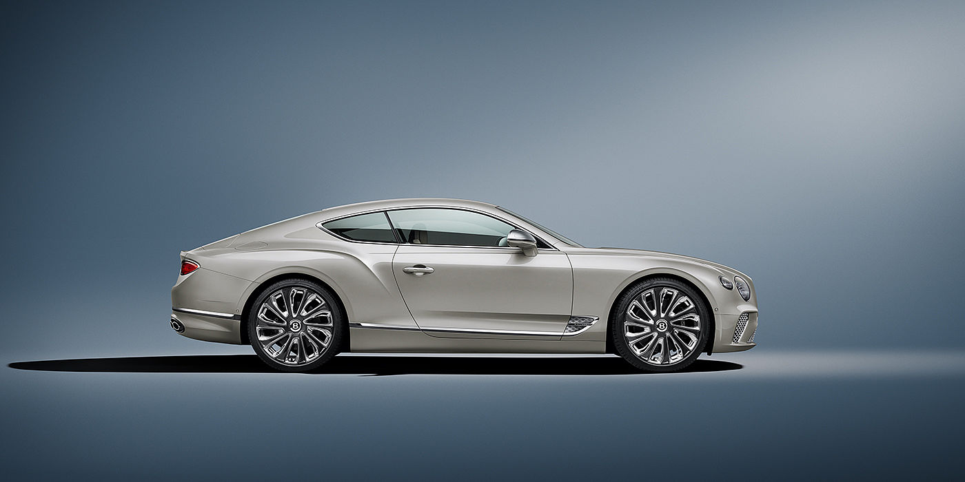 Emil Frey Exclusive Cars GmbH | Bentley Nürnberg Bentley Continental GT Mulliner coupe in White Sand paint front 34