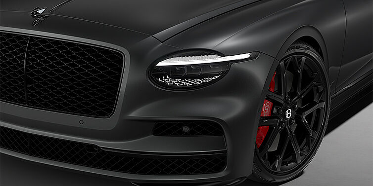 Feser-Graf Exclusive Cars GmbH | Bentley Nürnberg New Bentley Flying Spur S sedan head lamp against Anthracite Satin paint with 22" Sports wheel