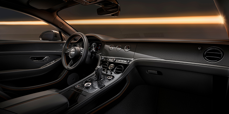 Feser-Graf Exclusive Cars GmbH | Bentley Nürnberg Bentley Continental GT Black Edition coupe front interior with Beluga black hide and High Gloss Carbon Fibre veneer