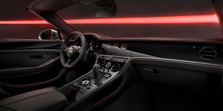 Feser-Graf Exclusive Cars GmbH | Bentley Nürnberg Bentley Continental GTC Black Edition convertible front interior with Beluga black hide and High Gloss Carbon Fibre veneer