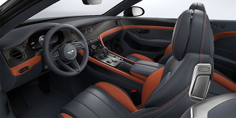 Feser-Graf Exclusive Cars GmbH | Bentley Nürnberg Bentley Continental GTC S convertible interior in Newmarket Tan and Beluga Black hides with Carbon Fibre veneer