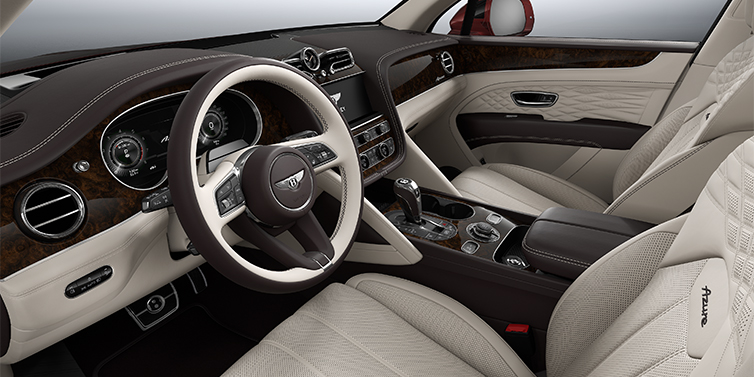 Feser-Graf Exclusive Cars GmbH | Bentley Nürnberg Bentley Bentayga EWB Azure SUV front interior in Linen and Burnt Oak hides with Dark Stained Burr Walnut veneer