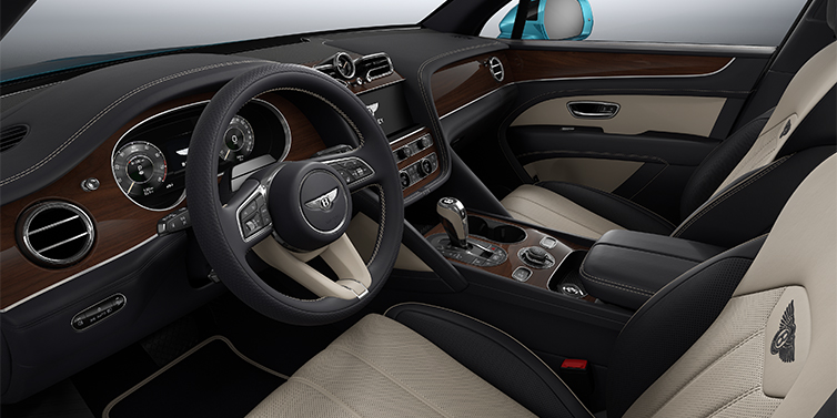 Feser-Graf Exclusive Cars GmbH | Bentley Nürnberg Bentley Bentayga EWB SUV front interior in Portland and Imperial Blue hides with Crown Cut Walnut veneer
