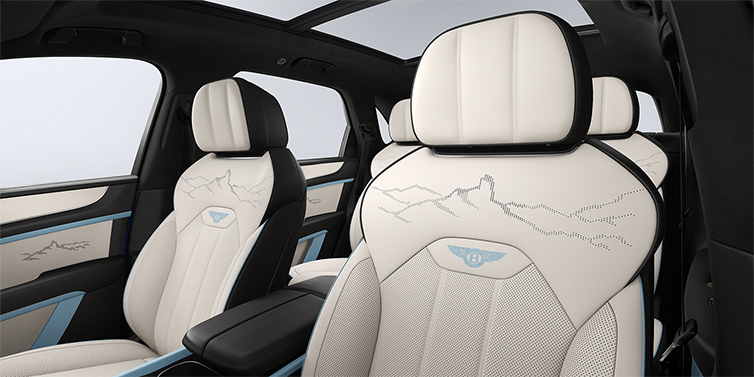 Feser-Graf Exclusive Cars GmbH | Bentley Nürnberg Bentley Bentayga Artenara Edition SUV front seats in Linen and Beluga Black hides with Light Blue accents and Artenara stitch detail