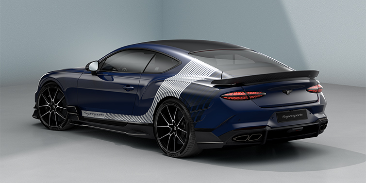 Feser-Graf Exclusive Cars GmbH | Bentley Nürnberg Bentley Supersports rear three quarter in "Skies" Design theme with Electric Blue paint finish and Arctica white and Oxford blue paint stripes across the rear haunch.