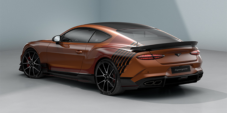 Feser-Graf Exclusive Cars GmbH | Bentley Nürnberg Bentley Supersports rear three quarter in "Meteorite" Design theme with Orange Flame paint and Beluga Black and Candy Red paint stripes across the rear haunch.