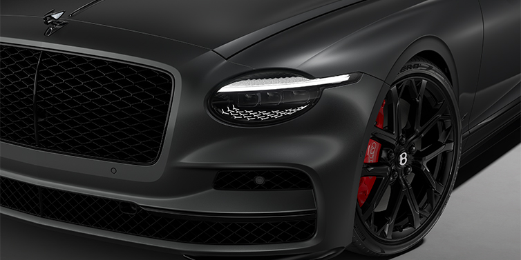 Feser-Graf Exclusive Cars GmbH | Bentley Nürnberg New Bentley Flying Spur S sedan head lamp against Anthracite Satin paint with 22" Sports wheel