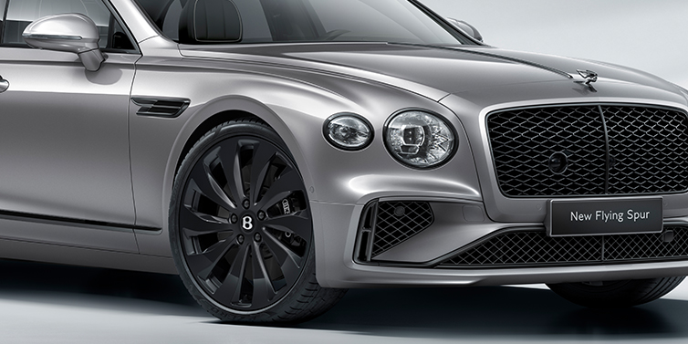 Feser-Graf Exclusive Cars GmbH | Bentley Nürnberg New Bentley Flying Spur sedan front bonnet in Silverlake paint with Black Specification with black ten spoke wheel, black matrix grille and black exterior details