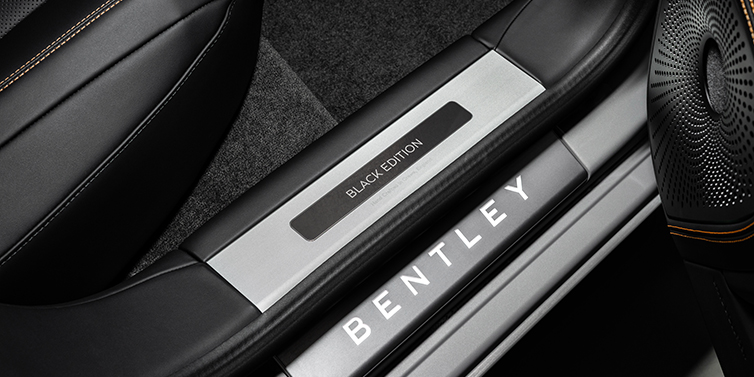 Feser-Graf Exclusive Cars GmbH | Bentley Nürnberg Bentley Flying Spur Black Edition sedan limited edition treadplate featuring Black Edition wording with Beluga black hide