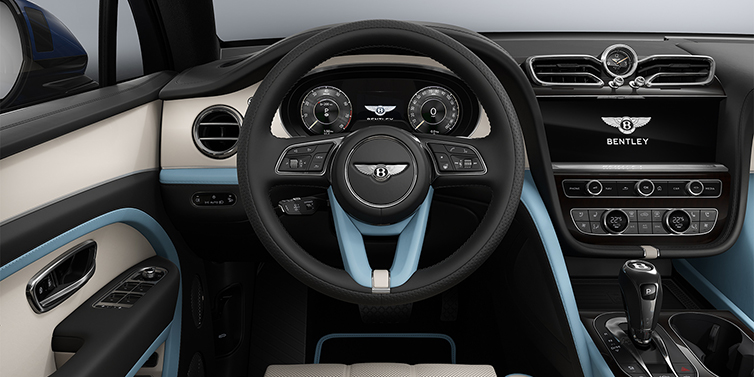 Feser-Graf Exclusive Cars GmbH | Bentley Nürnberg Bentley Bentayga Artenara Edition SUV steering wheel view in Linen and Beluga Black hides with Light Blue accents and Piano Linen veneer