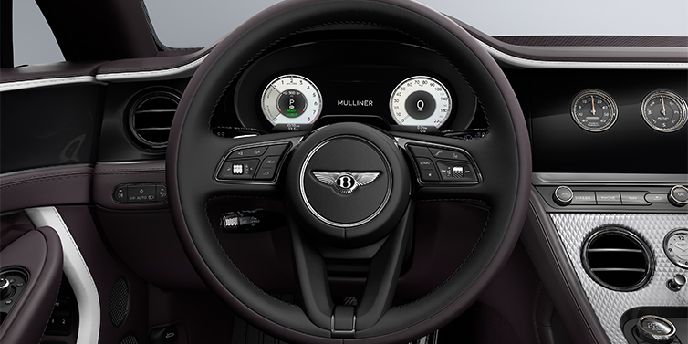 Feser-Graf Exclusive Cars GmbH | Bentley Nürnberg Bentley Continental GT Mulliner coupe steering wheel in Beluga black and Damson hides with white accent hide