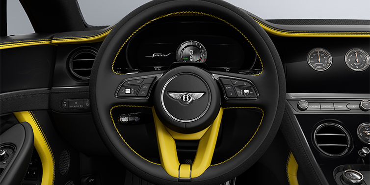 Feser-Graf Exclusive Cars GmbH | Bentley Nürnberg Bentley Continental GT Speed coupe steering wheel in Cyber Yellow and Beluga black hides