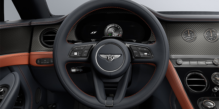 Feser-Graf Exclusive Cars GmbH | Bentley Nürnberg Bentley Continental GTC S convertible steering wheel and dash in Newmarket Tan and Beluga Black hides with Carbon Fibre veneer
