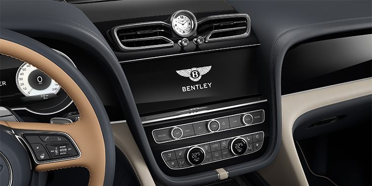 Feser-Graf Exclusive Cars GmbH | Bentley Nürnberg Bentley Bentayga EWB Mulliner SUV centre console detail showing Bentley Wings