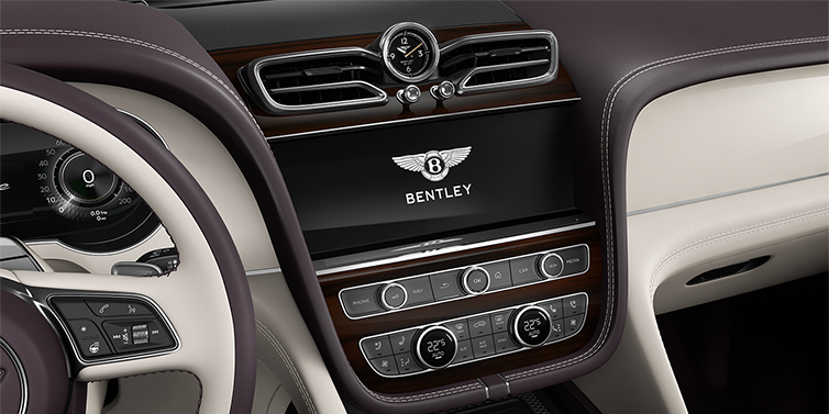 Feser-Graf Exclusive Cars GmbH | Bentley Nürnberg Bentley Bentayga Azure SUV centre console detail showing Bentley Wings