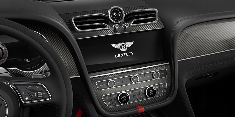 Feser-Graf Exclusive Cars GmbH | Bentley Nürnberg Bentley Bentayga Speed SUV centre console detail showing Bentley Wings